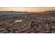 Sunset aerial view of community near mountains at 1622 E Nighthawk Way, Phoenix, AZ 85048