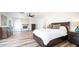 Large bedroom with wood floors and a king-size bed at 1622 E Nighthawk Way, Phoenix, AZ 85048