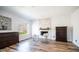 Bedroom with fireplace, wood floors, and mountain views at 1622 E Nighthawk Way, Phoenix, AZ 85048