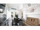 Elegant dining room with a large table, chandelier, and hardwood floors at 1622 E Nighthawk Way, Phoenix, AZ 85048