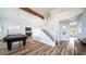 Game room with pool table, hardwood floors, and a staircase at 1622 E Nighthawk Way, Phoenix, AZ 85048