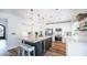 Modern kitchen with a large island, stainless steel appliances, and white cabinets at 1622 E Nighthawk Way, Phoenix, AZ 85048