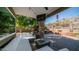 Relaxing covered patio with outdoor seating and mountain views at 1622 E Nighthawk Way, Phoenix, AZ 85048