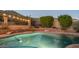 Lovely kidney shaped pool in backyard at dusk with hill views at 1622 E Nighthawk Way, Phoenix, AZ 85048