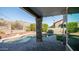 Inviting kidney-shaped pool with brick coping and a covered patio at 1622 E Nighthawk Way, Phoenix, AZ 85048