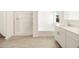 Bathroom with double vanity, shower, and soaking tub at 22550 W Tonopah Dr, Surprise, AZ 85387