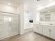 Bathroom boasts double vanity, soaking tub, and shower at 22550 W Tonopah Dr, Surprise, AZ 85387