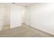 Spacious bedroom with an ensuite bathroom and walk-in closet at 22550 W Tonopah Dr, Surprise, AZ 85387