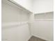 Walk-in closet with double hanging rods at 22550 W Tonopah Dr, Surprise, AZ 85387