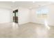 Bright dining area with tile flooring and sliding glass door at 22550 W Tonopah Dr, Surprise, AZ 85387