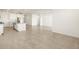 Open concept kitchen with island and breakfast bar at 22550 W Tonopah Dr, Surprise, AZ 85387