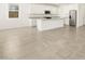 Modern kitchen with island and stainless steel appliances at 22550 W Tonopah Dr, Surprise, AZ 85387