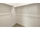 Large walk-in closet with double hanging rods at 36914 W La Paz St, Maricopa, AZ 85138