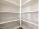 Bright and spacious pantry with ample shelving for storage at 36914 W La Paz St, Maricopa, AZ 85138