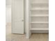 Walk-in pantry with adjustable shelving at 36914 W La Paz St, Maricopa, AZ 85138
