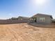 Spacious backyard ready for landscaping, creating a perfect outdoor oasis at 8612 W Warner St, Tolleson, AZ 85353