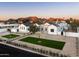 Aerial view of custom home with xeriscaping, stone accents, and mountain views at 9810 N 57Th St, Paradise Valley, AZ 85253