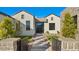 Modern farmhouse with stone accents and landscaped grounds at 9810 N 57Th St, Paradise Valley, AZ 85253