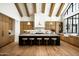 Modern kitchen with large island, stone countertops, and custom cabinetry at 9810 N 57Th St, Paradise Valley, AZ 85253