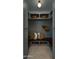 Gray mudroom with built-in bench and storage at 9810 N 57Th St, Paradise Valley, AZ 85253