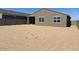 Expansive backyard with a simple patio and lots of space for outdoor activities and customization at 20357 N 225Th Dr, Surprise, AZ 85387