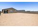 Large backyard with a covered patio perfect for outdoor entertaining at 20357 N 225Th Dr, Surprise, AZ 85387
