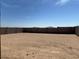 Large, spacious backyard with potential for customization and landscaping opportunities at 20357 N 225Th Dr, Surprise, AZ 85387