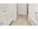 Well-lit bathroom featuring a tub and shower combo and modern tiling at 20357 N 225Th Dr, Surprise, AZ 85387
