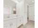 Bright bathroom with dual sink vanity, modern fixtures, and large mirror at 20357 N 225Th Dr, Surprise, AZ 85387