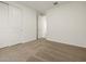 Bedroom with a large closet and a neutral-toned carpet at 20357 N 225Th Dr, Surprise, AZ 85387