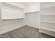 Walk-in closet with custom shelving and ample storage space at 20357 N 225Th Dr, Surprise, AZ 85387