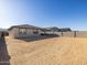 Large backyard with block wall and new home at 22526 W Tonopah Dr, Surprise, AZ 85387