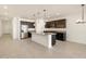 Modern kitchen with stainless steel appliances and island at 22526 W Tonopah Dr, Surprise, AZ 85387