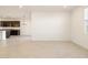 Open floor plan living room and kitchen at 22526 W Tonopah Dr, Surprise, AZ 85387