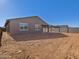 Large backyard with unlandscaped desert lot at 36954 W La Paz St, Maricopa, AZ 85138