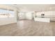 Open concept kitchen with island and granite countertops at 36954 W La Paz St, Maricopa, AZ 85138