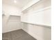 Spacious walk-in closet with double hanging rods and shelving at 36954 W La Paz St, Maricopa, AZ 85138