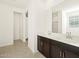 Bathroom with double vanity and tile flooring at 37406 W San Clemente St, Maricopa, AZ 85138