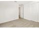 Bright bedroom with neutral carpeting and double door closet at 37406 W San Clemente St, Maricopa, AZ 85138