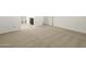 Carpeted bedroom with view of bathroom at 37406 W San Clemente St, Maricopa, AZ 85138