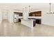 Modern kitchen with stainless steel appliances and island at 37406 W San Clemente St, Maricopa, AZ 85138
