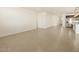 Bright and airy living room with tile floors at 37406 W San Clemente St, Maricopa, AZ 85138