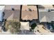 Aerial view of a single-Gathering home featuring a putting green, covered parking and mature tree at 4121 W Medlock Dr, Phoenix, AZ 85019