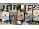 An aerial view showcases a neighborhood with well-maintained homes and backyards at 4121 W Medlock Dr, Phoenix, AZ 85019