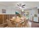Dining area with a wooden table and six chairs, near the kitchen at 4121 W Medlock Dr, Phoenix, AZ 85019