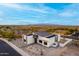 The property is a modern design with clean lines and a desert landscape at 17872 W Estes Way, Goodyear, AZ 85338