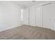 Bright, carpeted bedroom with closet offering a serene and organized space at 20331 N 225Th Dr, Surprise, AZ 85387