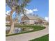 Elegant community center set by a serene pond, offering a beautiful venue for gatherings and events at 4196 E Bonanza Rd, Gilbert, AZ 85297