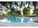 Inviting community pool featuring playful water features and ample lounging space for summertime enjoyment at 4196 E Bonanza Rd, Gilbert, AZ 85297