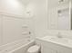 Bright, clean bathroom with a tub/shower combination and a single sink vanity at 4256 W Jeanette Ln, San Tan Valley, AZ 85144